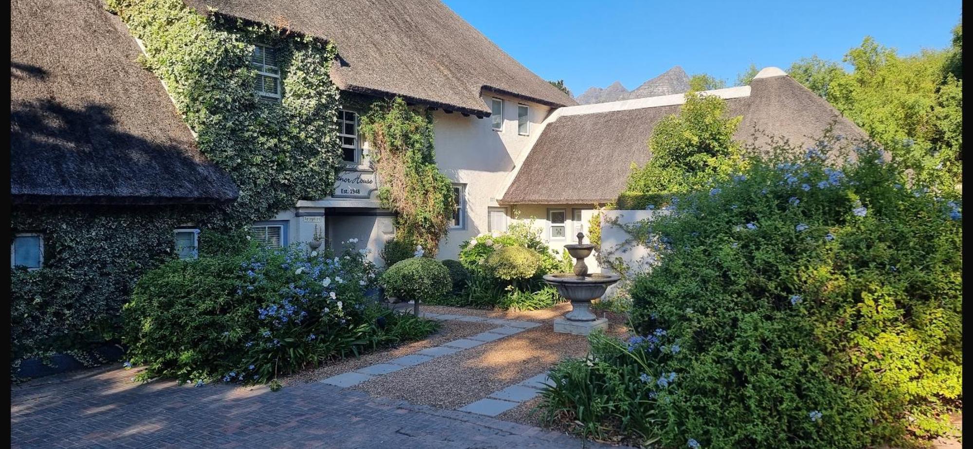 In The Vine Country Manor Guesthouse สเตลเลนบอช ภายนอก รูปภาพ
