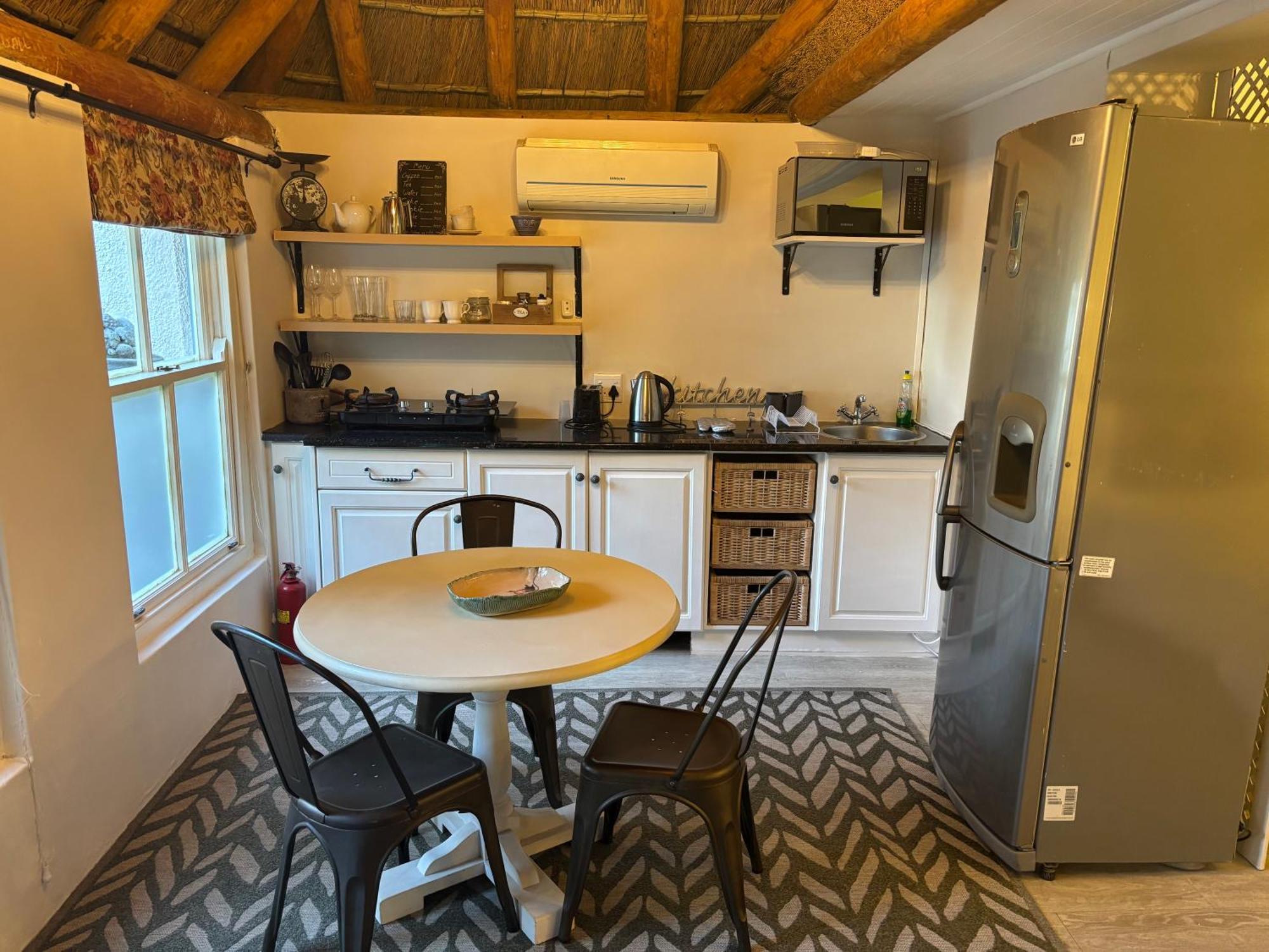 In The Vine Country Manor Guesthouse สเตลเลนบอช ภายนอก รูปภาพ
